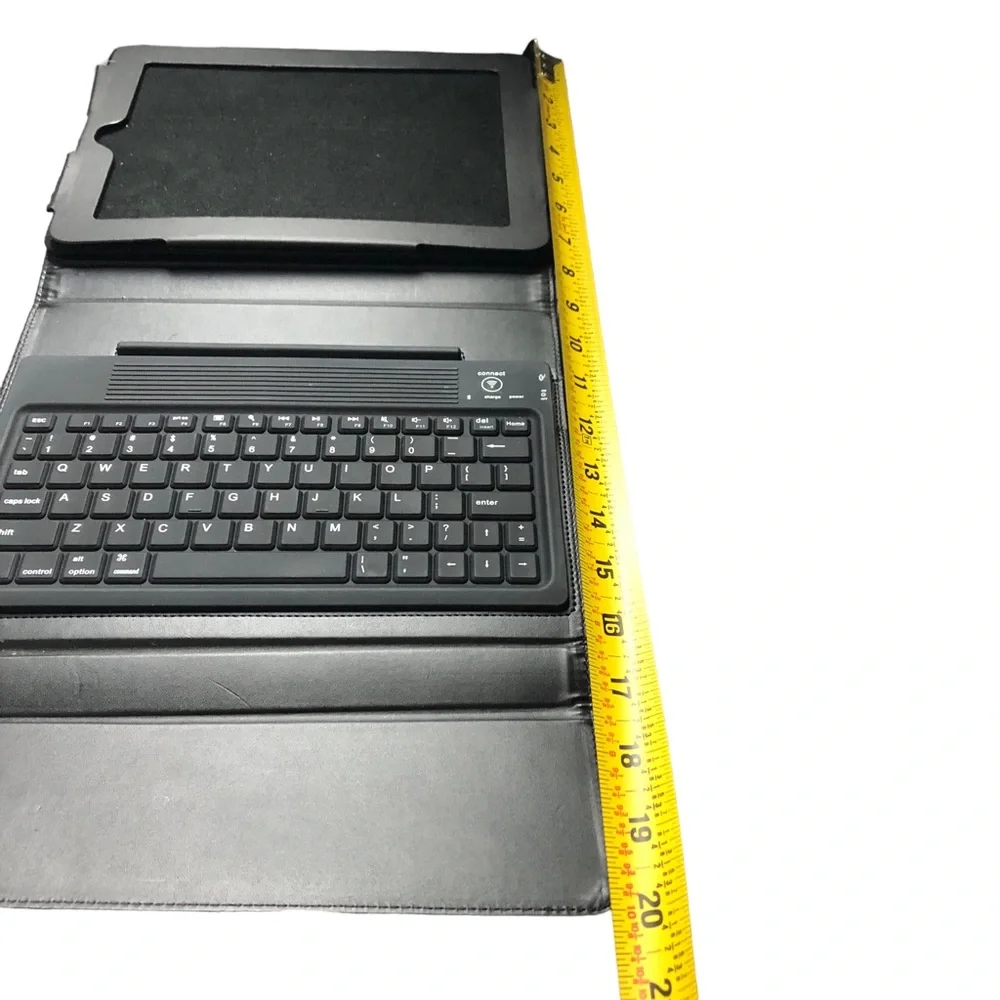 BROOKSTONE IPad cover, keyboard and stand. Black Leather